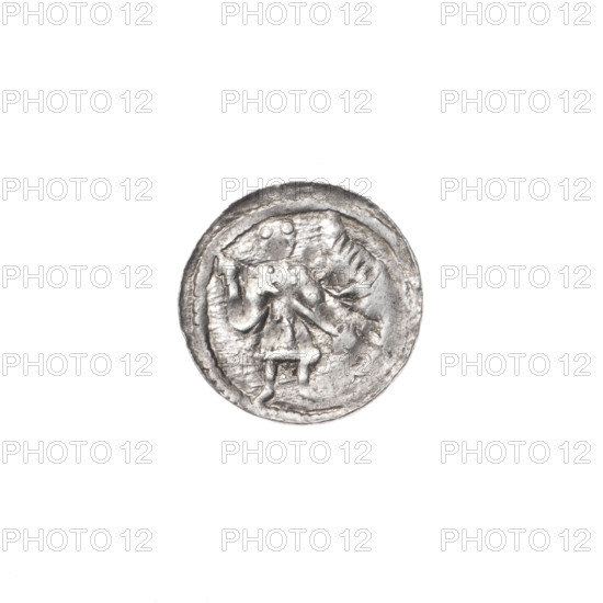 denarius, Boleslaw III Krzywousty (prince of Poland; 1086–1138), Romanesque style, allegories; iconography: knight in chain mail, spear/spearhead, dragon (jaws), equal-armed cross, fight between good and evil, fight against pagans, martyrs, Adalbert (St.; ca. 956–997). Obverse: in the beaded border, a knight in chain mail thrusting a spearhead into the jaws of an upside-down dragon. Reverse: in the triple beaded border, an isosceles cross topped with balls; between its arms, one ball. ca. 1125–1138. Poland, Kraków. Coin; diameter 12.6 mm; weight 0.40 g.