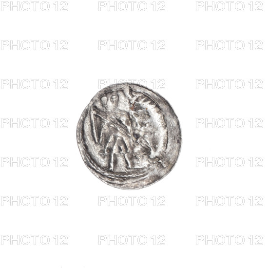 Denarius of Boleslaw III Krzywousty (prince of Poland; ca. 1086–1138), ca. 1125–1138. Obverse: in the beaded border, a knight in chain mail thrusting a spearhead into the jaws of an upside-down dragon. Reverse: in the triple beaded border, an isosceles cross topped with balls; at the intersection of the arms a ball; between the arms, one sun. Romanesque style; iconography includes spearhead, equal-armed cross, chain mail, jaws, martyrs/knight, dragons, fight between good and evil/fight against pagans, spears, Saint Adalbert. Coin; Poland, Kraków. Diameter 12.2–12.6 mm; weight 0.37 g.