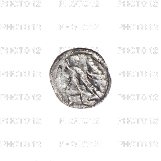 Denarius of Boleslaw III Krzywousty (prince of Poland; ca. 1086–1138). Obverse: in a beaded border, a knight in chain mail thrusting a spearhead into the jaws of an upside-down dragon. Reverse: in a triple beaded border, an isosceles cross topped with balls; at the intersection of the arms, a ball with a dot; between the arms, one ball (one with a dot). Iconography: chain mail, spearhead (issue mark), equal-armed cross, crosses, jaws, knight, martyrs, dragons, Romanesque style; themes of Middle Ages, fight between good and evil, fight against pagans; depiction of Saint Adalbert (ca. 956–997). Date: ca. 1125–1138. Place: Poland, Kraków. Medium: coin (denarius). Diameter: 11.3–12.2 mm. Weight: 0.35 g.