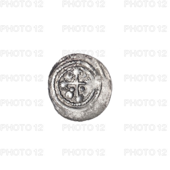 Denarius of Boleslaw III Krzywousty (prince of Poland; c. 1107–1138). Obverse: within a linear border, a knight in chain mail thrusting a spearhead into the jaws of an upside-down dragon; a sun beneath the knight’s right elbow. Reverse: within a triple beaded border, an isosceles cross topped with suns; between its arms, three quarters contain two radiating spheres (smaller ones nearer the center, a larger one), the fourth quarter contains a single large sphere; one arm intersects the other at approximately one-third of its length. Romanesque style; allegorical/Christian imagery (fight between good and evil, fight against pagans, martyrs, knights, dragons, St. Adalbert). c. 1125–1138. Poland, Kraków. Coin; diameter 11.9–12.4 mm; weight 0.32 g.