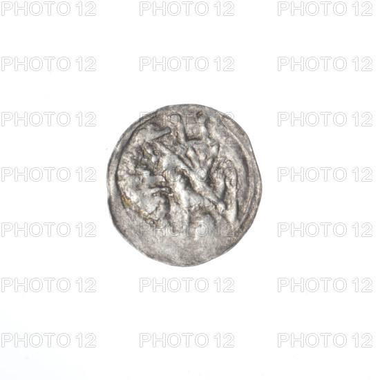 denarius, Boleslaw III Krzywousty (prince of Poland; 1086–1138), allegories, equal-armed cross, crosses, spearhead (issue mark), jaws, chain mail, knight, martyrs, Romanesque (style), dragons, Middle Ages, fight between good and evil, fight against pagans, spear, Adalbert (St.; ca. 956–997), Obv. In the beaded border, a knight in chain mail thrusting a spearhead into the jaws of a dragon turned upside down. Rv. In the triple beaded border, an isosceles cross topped with balls. Between its arms, one ball (one of them with a dot). ca. 1125–1138, Poland, Kraków, coin, diameter 12.8–13.2 mm, weight 0.40 g