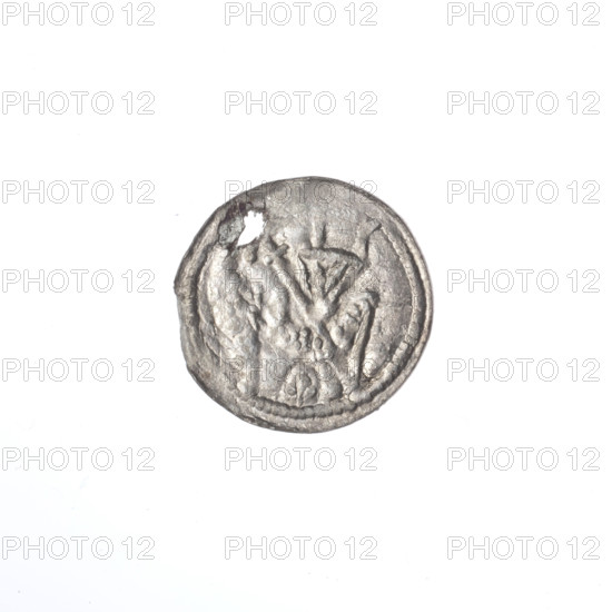 Denarius, Boleslaw III Krzywousty (prince of Poland; 1086–1138). Obverse: in the beaded border, a knight in chain mail thrusting a spearhead into the jaws of an upside-down dragon. Reverse: in the triple beaded border, an isosceles cross topped with balls; at the intersection of the arms, a ball; one ball between the arms. Allegorical imagery of knights, dragons, fight between good and evil, fight against pagans; motifs include equal-armed cross, spearhead (issue mark), jaws, chain mail, crosses, martyrs, Adalbert (Saint; ca. 956–997), spears. Romanesque style. Date ca. 1125–1138. Poland, Kraków. Coin (denarius); diameter 12.8–13.2 mm; weight 0.28 g.