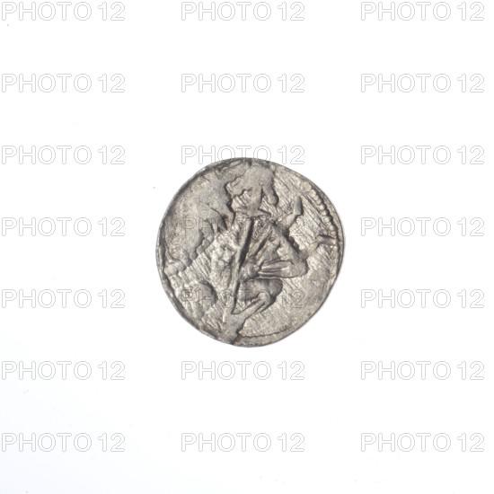 denarius, Boleslaw III Krzywousty (prince of Poland; 1086–1138), allegories, equal-armed cross, spearhead (issue mark), crosses, jaws, chain mail, knight, Romanesque (style), martyrs, knights, dragons, dragon, Middle Ages, fight against pagans, fight between good and evil, Adalbert (Saint; ca. 956–997), spear, spears. Obv. In the beaded border, a knight in chain mail thrusting a spearhead into the jaws of a dragon turned upside down. Rv. In the triple beaded border, an isosceles cross topped with balls. At the intersection of the arms, a ball. Between them, one ball. One arm intersects the other at approximately 1/3 of its length. ca. 1125–1138, Poland, Kraków, coin, diameter 11.5–11.9 mm, weight 0.44 g