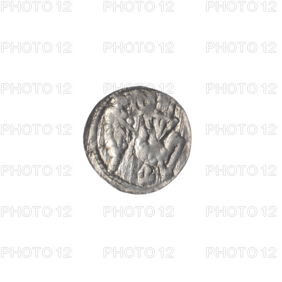 Denarius of Boleslaw III Krzywousty (prince of Poland; 1107–1138). Obverse: in the beaded border, a knight in chain mail thrusting a spearhead into the jaws of an upside-down dragon. Reverse: in the triple beaded border, an isosceles cross topped with spheres (one with a dot; others unclear due to field blurring), a dot at the intersection of the arms, and one sun between the arms. Allegories of martyrs and knights; motifs include equal-armed cross, crosses, spearhead (issue mark), jaws, chain mail, dragons — Romanesque style; themes of Middle Ages, fight between good and evil, fight against pagans; possible reference to St. Adalbert. ca. 1125–1138. Poland, Kraków. Coin; diameter 11.8 mm; weight 0.33 g.