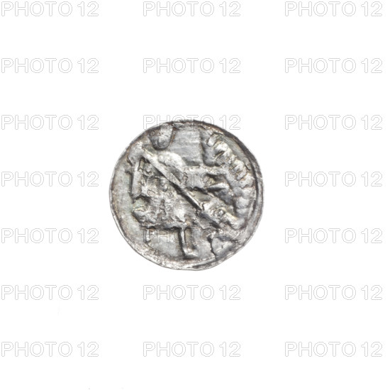 denarius, Boleslaw III Krzywousty (prince of Poland; 1086–1138), spearhead (issue mark), equal-armed cross (iconographic), mouth (iconographic), chain mail (iconographic), chain mails, martyrs, crosses, mouths, Romanesque (style), dragons, dragon (iconographic), knights, knight (iconographic), fight between good and evil (iconographic), fight against pagans (iconographic), spears, spear (iconographic), Middle Ages, Adalbert (Saint; ca. 956–997). Obv. In the linear border, a knight in chain mail thrusting a spearhead into the jaws of a dragon turned upside down. Above the knight's left foot, on its outer side, a dot. Rv. In the triple beaded border, an isosceles cross topped with balls. Between its arms, one ball (two of them with one dot). ca. 1125–1138, Kraków, Poland; coin; diameter 12.1 mm; weight 0.43 g.
