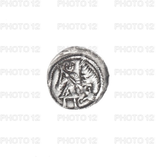 denarius, Boleslaw III Krzywousty (prince of Poland; 1107–1138), allegories, Boleslaw III Krzywousty (prince of Poland; 1086–1138), spearhead (issue mark), chain mail (iconographic), equal-armed cross (iconographic), chain mail, crosses, mouth (iconographic), martyrs, knight (iconographic), Romanesque (style), mouths, dragons, knights, dragon (iconographic), Middle Ages, fight between good and evil (iconographic), Adalbert (Saint; ca. 956–997), fight against pagans (iconographic), spear (iconographic), spears. Obv. In the beaded border, a knight in chain mail thrusting a spearhead into the jaws of a dragon turned upside down. Rv. In the triple beaded border, an isosceles cross topped with balls. Between its arms, one ball. One arm intersects the other at approximately 1/3 of its length. ca. 1125–1138. Poland, Kraków. Coin. Diameter 12.2–12.7 mm. Weight 0.57 g.