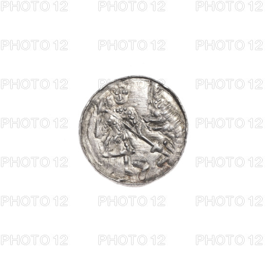 Denarius, Boleslaw III Krzywousty (prince of Poland; 1107–1138), ca. 1125–1138. Obverse: in beaded border, a knight in chain mail thrusting a spearhead into the jaws of an upside-down dragon; at the knight's left foot a figure resembling the number '7' with vertices marked by dots. Reverse: in triple beaded border, an isosceles cross topped with spheres; between its arms radiate two spheres (smaller ones closer to the center, larger ones farther). Romanesque style; allegorical Christian imagery (fight between good and evil, fight against pagans, St. Adalbert). Minted in Kraków, Poland. Coin; silver denarius; diameters 12.3–12.9 mm; weight 0.47 g.
