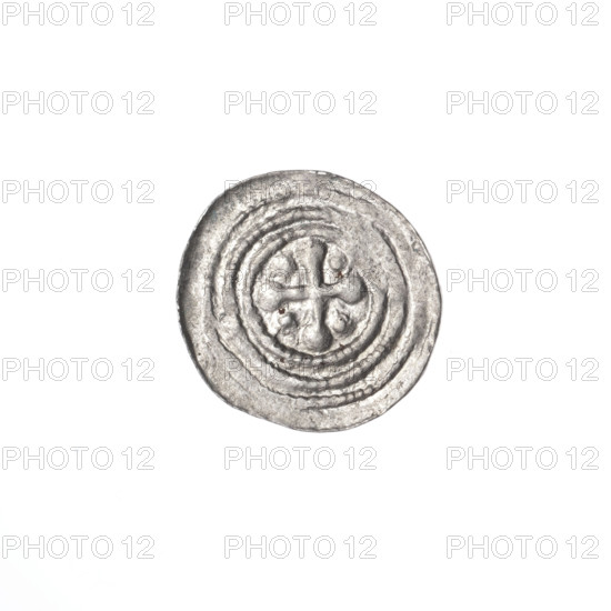 denarius, Boleslaw III Krzywousty (prince of Poland; 1086–1138), allegories, spearhead (issue mark), chain mail (iconographic), equal-armed cross (iconographic), chain mail, crosses, mouth (iconographic), knight (iconographic), martyrs, Romanesque (style), dragons, knights, dragon (iconographic), Middle Ages, mouths, Adalbert (Saint; ca. 956–997), fight between good and evil (iconographic), spear (iconographic), spears, fight against pagans (iconographic). Obv. In the beaded border, a knight in chain mail thrusting a spearhead into the jaws of a dragon turned upside down. At the knight's left foot, a figure resembling the number '7'; its angle is directed toward the foot and the figure's vertices are marked with dots. Rv. In the triple beaded border, an isosceles cross topped with balls; between its arms, one ball (three of them have one dot). One arm intersects the other at approximately 1/3 of its length. c. 1125–1138. Poland, Kraków. Coin; diameter 12.8 mm; weight 0.36 g.