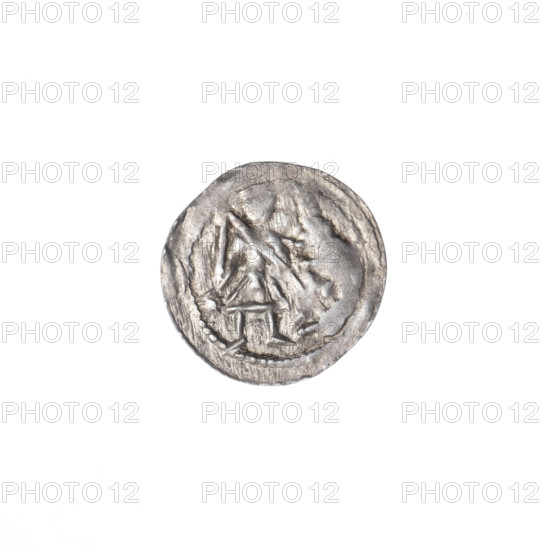 denarius, Boleslaw III Krzywousty (prince of Poland; 1086–1138), Romanesque, allegories, equal-armed cross, chain mail, crosses, spearhead (issue mark), knight, martyrs, dragon, fight between good and evil, spears, fight against pagans, Adalbert (St.; ca. 956–997). Obv.: in the beaded border, a knight in chain mail thrusting a spearhead into the jaws of an upside-down dragon; a sun under the knight's right elbow. Rv.: in the triple beaded border, an isosceles cross topped with suns; between its arms, in two quarters radiating two spheres (smaller ones nearer the center, larger ones farther out), and one sphere in each of the other two quarters. ca. 1125–1138; Poland, Kraków. Coin; diameter 12.1–12.7 mm; weight 0.38 g.