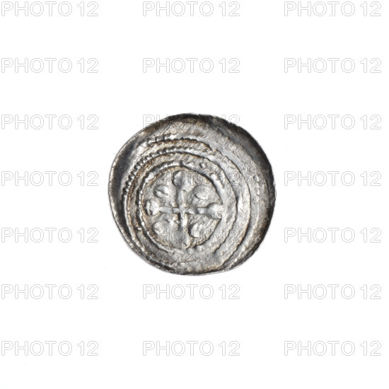 denarius, Boleslaw III Krzywousty (prince of Poland; 1086–1138), allegories, spearhead (issue mark), equal-armed cross (iconographic), chain mail (iconographic), crosses, jaws (iconographic), chain mails, knight (iconographic), martyrs, Romanesque (style), dragons, jaws, knights, Adalbert (St.; ca. 956–997), dragon (iconographic), Middle Ages, fight against pagans (iconographic), spear (iconographic), fight between good and evil (iconographic), spears. Obverse: in the beaded border, a knight in chain mail thrusting a spearhead into the jaws of an upside-down dragon. Reverse: in the triple beaded border, an isosceles cross topped with balls; between its arms, one ball. ca. 1125–1138. Poland, Kraków. Coin. Diameter 12.8–13.3 mm. Weight 0.47 g.