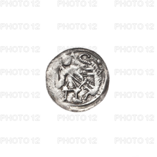 denarius, Boleslaw III Krzywousty (Prince of Poland; 1107–1138), allegories, Boleslaw III Krzywousty (Prince of Poland; 1086–1138), spearhead (issue mark), chain mail (iconographic), chain mails, equal-armed cross (iconographic), crosses, jaws (iconographic), knight (iconographic), dragons, martyrs, Romanesque (style), dragon (iconographic), knights, jaws, Middle Ages, fight between good and evil (iconographic), Adalbert (Saint; ca. 956–997), fight against pagans (iconographic), spears, spear (iconographic). Obverse: in the linear border, a knight in chain mail thrusting a spearhead into the jaws of a dragon turned upside down. Reverse: in the triple beaded border, an isosceles cross topped with balls (one dot on each); between its arms, one ball (three of them show one dot; the fourth is obscured by under-striking). ca. 1125–1138, Poland, Kraków; coin; diameter 11.3–11.8 mm; weight 0.46 g.