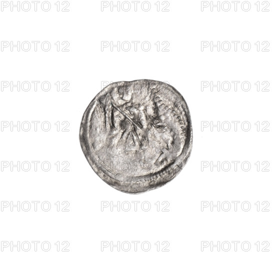 Denarius of Boleslaw III Krzywousty (prince of Poland; ca. 1086–1138), ca. 1125–1138. Obverse: within a beaded border, a knight in chain mail thrusting a spearhead into the jaws of an upside-down dragon; under the knight's right elbow, an isosceles cross topped with balls. Reverse: within a triple beaded border, an isosceles cross topped with balls; at the intersection of the arms a ball, and between that central ball and a crossbar at the end of one arm a single ball; one arm intersects the other at approximately one-third of its length. Motifs: knight, dragon, fight between good and evil, fight against pagans, martyrs, spears, equal-armed cross; Romanesque style; possible reference to Saint Adalbert. Coin; Kraków, Poland. Diameter 12.6–13.1 mm; weight 0.44 g.