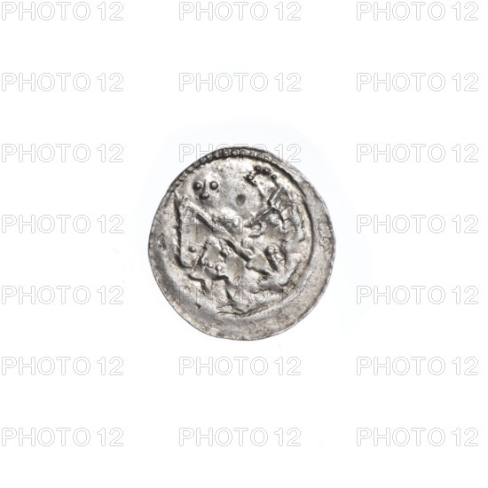 denarius, Boleslaw III Krzywousty (prince of Poland; 1086–1138), allegories, equal-armed cross, spearhead (issue mark), chain mail, crosses, mouth, knight, martyrs, Romanesque (style), knights, dragon, dragons, mouths, Middle Ages, fight between good and evil, Adalbert (Saint; ca. 956–997), fight against pagans, spear, spears. Obv.: In the beaded border, a knight in chain mail thrusting a spearhead into the jaws of a dragon turned upside down. Rv.: In the triple beaded border, an isosceles cross topped with spheres (one with a dot). Between its arms, one sphere (two have a dot). One arm intersects the other at approximately 1/3 of its length. c. 1125–1138, Poland, Kraków, coin; diameter 11.7–12.2 mm; weight 0.34 g.