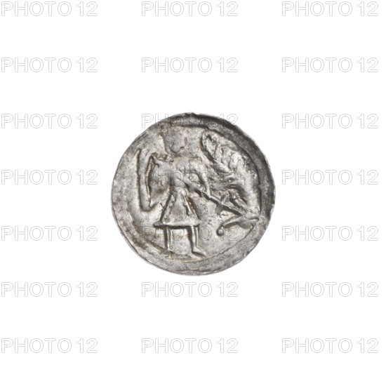 denarius, Boleslaw III Krzywousty (prince of Poland; c. 1086–1138), Romanesque style, c. 1125–1138, Poland, Kraków. Coin. Obverse: in beaded border, a knight in chain mail thrusting a spearhead into the jaws of an upside-down dragon; equal-armed cross, spears, knight, dragons, fight between good and evil, Adalbert (Saint), martyrs. Reverse: in triple beaded border, an isosceles cross topped with balls (two with one dot each), a dot at the crossing of the arms; between them, suns (three with one dot each; the fourth obscured by under-striking). Diameter 12.8–13.1 mm; weight 0.68 g. Makers/marks: spearhead (issue mark).