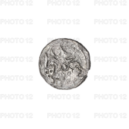 Denarius, Boleslaw III Krzywousty (prince of Poland; 1107–1138). Obverse (beaded border): a knight in chain mail thrusting a spearhead into the jaws of an upside-down dragon; under the knight's right elbow three dots forming a triangle, under the left elbow two vertically aligned dots. Reverse (triple beaded border): an isosceles cross topped with spheres (one with a dot); between its arms one dot nearer the center and one sun nearer the ends (two of them with a single dot each). Romanesque style; imagery of knights, dragons, fight against pagans, fight between good and evil; references to martyrs and St. Adalbert (ca. 956–997). Attributed to Jastrzebowski, Stanislaw (1898–1980) as cataloger/identifier. ca. 1125–1138, Poland, Kraków. Coin; diameter 12.3–12.8 mm; weight 0.43 g.