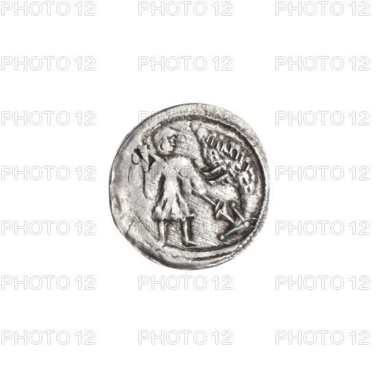 denarius, Boleslaw III Krzywousty (prince of Poland; 1086–1138), allegories, spearhead (issue mark), equal-armed cross, crosses, jaws, chain mail, knight, martyrs, Romanesque (style), knights, dragons, Middle Ages, fight between good and evil, fight against pagans, spear, Wojciech (St.; ca. 956–997). Obv.: In the beaded border, a knight in chain mail thrusting a spearhead into the jaws of an upside-down dragon. Rv.: In the triple beaded border, an isosceles cross topped with balls (three show one dot each; the fourth may also have one but is under-struck). Between its arms, one ball (two show one dot each; the other two may also but are obscured by under-striking). ca. 1125–1138. Poland, Kraków. Coin. Diameter 13.2–13.7 mm. Weight 0.57 g.