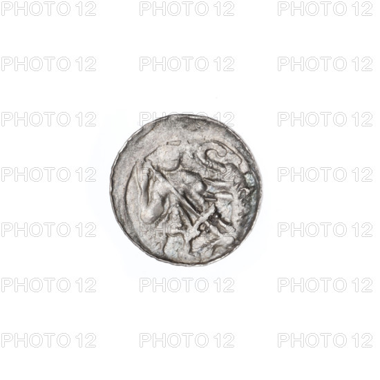 Denarius, Boleslaw III Krzywousty (prince of Poland; 1086/1107–1138). Obv.: in a linear border, a knight in chain mail thrusting a spearhead into the jaws of an upside-down dragon. Rv.: in a triple beaded border, an isosceles cross topped with balls (two of them with one dot each); between its arms, one ball (two of them with one dot each; possibly also on the other two—observation prevented by under-striking). Equal-armed cross, spearhead (issue mark), chain mail, crosses, jaws, knight, martyrs, Romanesque style, dragons, Middle Ages, knights, fight between good and evil, fight against pagans, Adalbert (St.; ca. 956–997), spears. Date: ca. 1125–1138. Place: Poland, Kraków. Coin; diameter 12.3–12.6 mm; weight 0.56 g.
