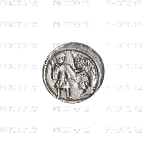 Denarius, Boleslaw III Krzywousty (Prince of Poland; 1107–1138), ca. 1125–1138. Obverse: in a beaded border, a knight in chain mail thrusting a spearhead into the jaws of an upside-down dragon; knight depicted with mouth visible, wearing chainmail and equal-armed cross motifs, evoking Romanesque style, knights, martyrs, fight between good and evil and fight against pagans, St. Adalbert associations. Reverse: in a triple beaded border, an isosceles cross topped with balls; between its arms, one ball (one with a dot). Coin (Kraków, Poland); diameter 12.7–13.2 mm; weight 0.52 g.