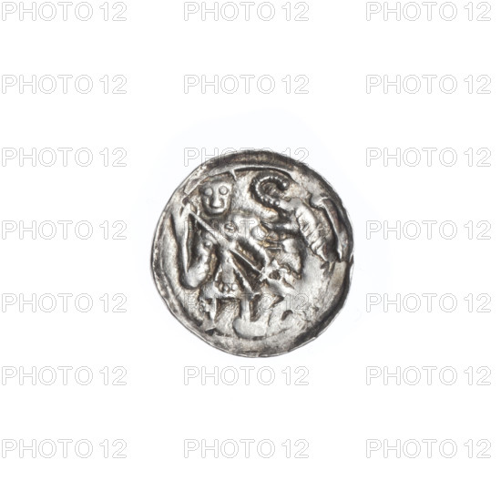 denarius, Boleslaw III Krzywousty (prince of Poland; 1086–1138), allegories, crosses, equal-armed cross, chainmail, mouth, martyrs, spearhead (issue mark), Romanesque (style), knight, dragon, Middle Ages, fight between good and evil, fight against pagans, Adalbert (St.; ca. 956–997), spear (iconographic), spears. Obv. In the beaded border, a knight in chain mail thrusting a spearhead into the jaws of a dragon turned upside down. Rv. In the triple beaded border, an isosceles cross topped with spheres (one of them with a dot). A dot at the crossing of the arms. Between them, one sun. ca. 1125–1138, Poland, Kraków, coin, diameter 12.3–12.8 mm, weight 0.55 g