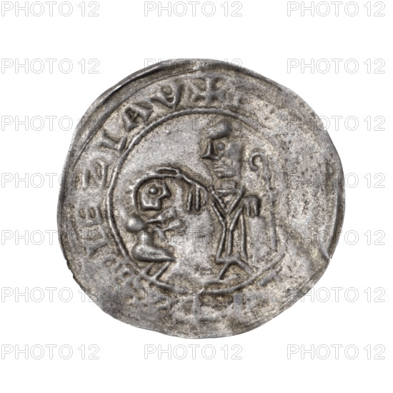 bracteate, Boleslaw III Wrymouth (Prince of Poland; 1107–1138), bishop, bishops, crosier, iconography of Boleslaw III Wrymouth (Prince of Poland; 1086–1138), gesture of protection, kneeling prince. In a pearl border, on the left, facing right, a kneeling prince shown in profile with hands outstretched towards the bishop standing before him. The bishop, dressed in the liturgical vestments of St. Wojciech, holds a crosier in his left hand while his right hand rests on the prince's head. Around the rim, in a linear border, inscription +BOLEZLAV. Date: 1135–1138. Place: Poland, Gniezno, Kraków. Object: coin (bracteate). Diameter: 26.8–27.6 mm. Weight: 0.56 g.