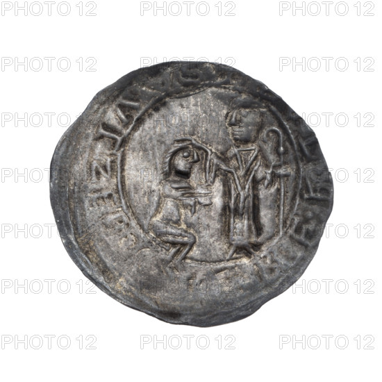Bracteate depicting Boleslaw III Krzywousty (Prince of Poland; 1086–1138). In a pearl border, on the left, a kneeling prince shown in profile with hands outstretched toward a standing bishop. Dressed in liturgical vestments, St. Adalbert (ca. 956–997) holds a crosier in his left hand while his right hand rests on the prince's head. Around the rim, in a linear border, is the inscription '+•L•R:EBBEZLAVS.' Romanesque style; 1135–1138. Coin (bracteate), diameter 26.0–27.8 mm, weight 0.58 g.
