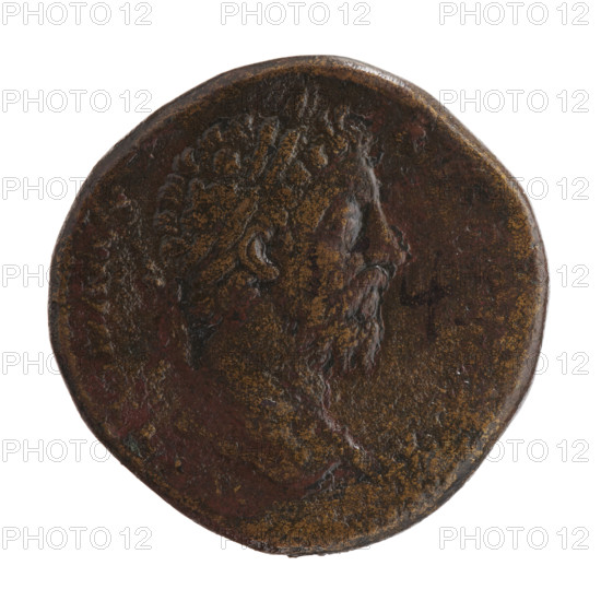 Sestertius of Marcus Aurelius (121–180; Roman emperor 161–180). Obverse: Head of Marcus Aurelius in a laurel wreath facing right, inscription ONINVS - AVG. Reverse: Annona standing left, holding ears of corn above a container (modius) with ears of corn in her right hand and a cornucopia in her left, inscription IM, VI, - COS] III. Fields: S - C. Date: 174–175. Roman Empire, Rome. Coin: diameter 32.0 mm, weight 25.6 g, axis 180°.