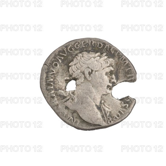 Denarius depicting bust of Trajan facing right, wearing a laurel wreath and robe; rim inscription: IMP TRAIANO AVG GER DAC PM TR P COS VPP. Reverse: Genius, naked, standing left, holding a patera in his outstretched right hand and corncobs in his lowered left hand; rim inscription: SPQR OPTIMO PRINCIPI. Coin has two intentional round holes (one widened, breaking off a piece) suggesting it was worn as a pendant. Date: 103–111 CE. Roman Empire (27 BC–476). Rome. Material: coin; weight 2.87 g.