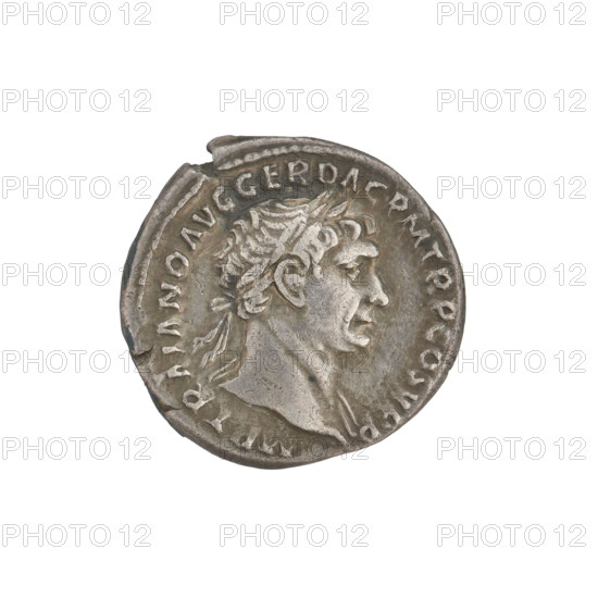 Denarius, Trajan (53–117; Roman emperor 98–117). Obverse: head of Trajan facing right, decorated with a laurel wreath; rim inscription IMP TRAIANO AVG GER DAC PM TR COS V PP. Reverse: Pax standing left, dressed only to the waist in a long robe with draperies, holding a caduceus in her right hand and a cornucopia in her left, resting her right leg on the shoulders of a Dacian (only the Dacian's arms and head are shown); rim inscription SPQR OPTIMO PRINCIPI. Date: 103–111. Rome, Roman Empire (27 BC–476). Coin; weight 3.15 g.