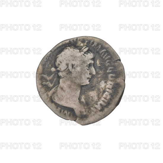 Denarius, Trajan (53–117 CE; Roman emperor 98–117). Obverse: head of Trajan in laurel wreath facing right; rim inscription: MO AVG GER DAC. Reverse: Virtus standing right, dressed in military attire, wearing a helmet, left foot on a helmet, holding a spear vertically in her right hand and a parazonium upwards in her left hand; rim inscription illegible. Date: 112–117 CE. Roman Empire (27 BC–476). Rome. Coin; weight 2.74 g.