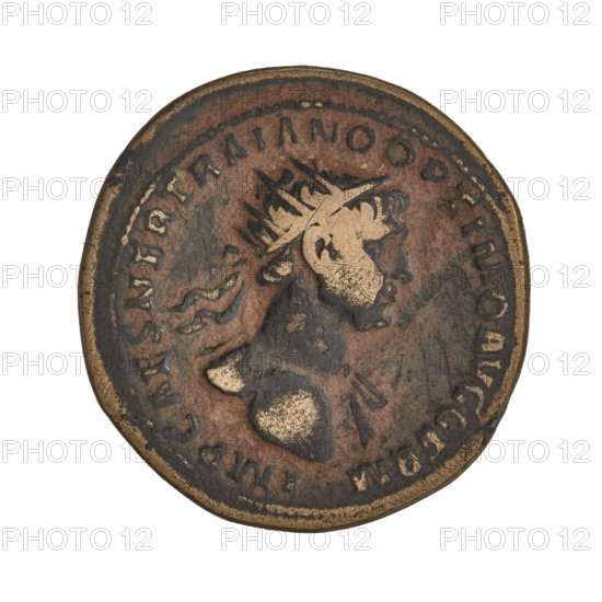 Obv.: head of Trajan (53–117; Roman Emperor 98–117) in radiant crown facing right; rim inscription: IMP CAES NER TRAIANO OPTIMO AVG GERM. Rev.: letters SC surrounded by an oak wreath; rim inscription: DAC PARTHICO PM TR POT XX COS VI PP. 114–117. Roman imperial bronze coin, Cyprus; oak wreaths, radiant crowns motifs; weight 10.10 g.