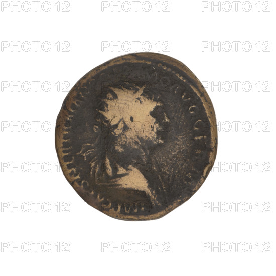 Trajan (53–117; Roman emperor 98–117). Obverse: head of Trajan in radiant crown facing right; rim inscription: IMP CAES NER TRAIANO OPTIMO AVG GERM. Reverse: letters SC surrounded by an oak wreath; rim inscription: DAC PARTHICO PM TR POT XX COS VI PP. Date: 114–117. Material: coin (weight 8.80 g). Origin: Cyprus, Roman Empire (27 BC–476). Motifs: oak wreaths, heads, radiant crowns.