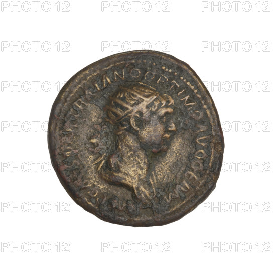 Trajan (53–117; Roman Emperor 98–117). Silver coin (denomination implied), 114–117. Obverse: head of Trajan in radiant crown facing right; rim inscription: IMP CAES NER TRAIANO OPTIMO AVG GERM. Reverse: letters SC surrounded by an oak wreath; rim inscription: DAC PARTHICO PM TR POT XX COS VI PP. Oak wreaths, radiant crowns, heads. Weight: 8.45 g. Cyprus. Roman Empire (27 BC–476).