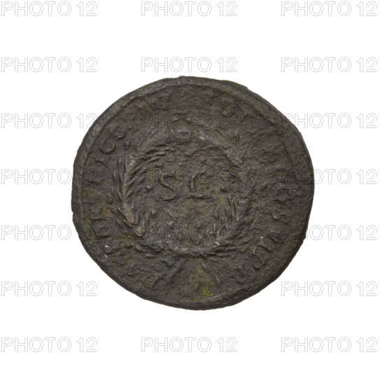 Trajan (53–117; Roman Emperor 98–117). Obverse: head of Trajan in radiant crown facing right; rim inscription: IMP CAES NER TRAIANO OPTIMO AVG GERM. Reverse: letters SC surrounded by an oak wreath; rim inscription: DAC PARTHICO PM TR POT XX COS VI PP. Oak wreaths, radiant crowns, heads; 114–117 CE. Roman Empire (27 BC–476). Cyprus. Coin; weight 7.72 g.