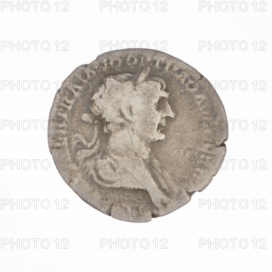 Denarius of Trajan (53–117; Roman emperor 98–117). Obverse: head of Trajan in a laurel wreath facing right; rim inscription ER TRAIANO OPTIMO AV. Reverse: Mars walking right, completely naked, cloak on shoulders, helmet on head, spear in right hand, trophy in left hand resting on left shoulder; rim inscription PM TRP CO. Date: 112–117. Roman Empire (27 BC–476). Coin, weight 2.95 g.