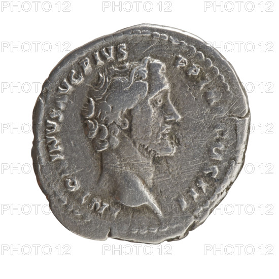 Denarius, Antoninus Pius (86–161; Roman emperor 138–161), issuer: Antoninus Pius. Obverse: Head of Antoninus Pius uncovered to the right, legend ANTONINVS AVG PIVS - PP TR, COS III. Reverse: Apollo stands frontally, head turned left, holding a patera in his outstretched right hand and a lyre in his left, legend APOLLINI - AVGVSTO. Iconography: Apollo, lyre, patera. Date: 140–144. Culture/place: Roman Empire, Rome. Medium/function: coin. Diameter: 18.0–18.5 mm. Weight: 2.91 g. Axis: 180 degrees.