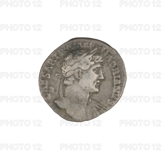 Denarius of Hadrian (76–138; Roman emperor 117–138). Obverse: bust of Hadrian right, laurel wreath in his hair; rim inscription IMPCAESARTRAIANHADRIANVS. Reverse: Fortuna standing left, wearing a long robe with draperies, holding a ship's rudder in her right hand and a cornucopia in her left; rim inscription PM TR P COS III. Date: 119–122. Place: Rome, Roman Empire. Medium: coin. Weight: 3.05 g.