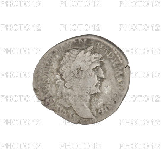 Denarius, Hadrian (76–138; Roman emperor 117–138). Obverse: Bust of Hadrian right, laurel wreath in his hair; rim inscription IMPCAESARTRAIANHADRIANVSAVG. Reverse: Genius standing left, naked, holding a patera in his right hand above a lit altar, corncobs in his left hand; rim inscription PM TR P COS III. Date: 119–122. Rome, Roman Empire (27 BC–476). Coin; weight 3.15 g.