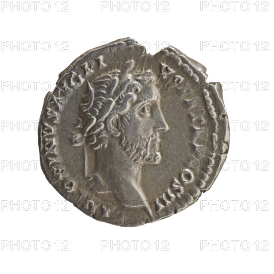 Denarius of Antoninus Pius (reign 138–161 CE). Obverse: Head of Antoninus Pius in a laurel wreath facing right, legend 'ANTONINVS AVG PI - VS' and control 'OS III'. Reverse: Container (modius) with two ears of corn and two poppy heads, legend 'ANNO - NA AVG'. Iconography: ears of corn, modius, cereals, poppy heads. Date: 140–144 CE. Roman Empire, minted in Rome. Coin: silver denarius, diameter 16.5–17.0 mm, weight 3.22 g, axis 195°.