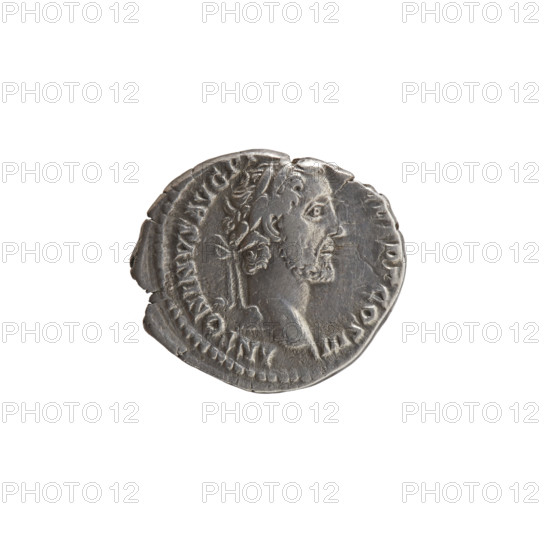 Denarius of Antoninus Pius (86–161; Roman Emperor 138–161). Obverse: Head of Antoninus Pius in a laurel wreath facing right, legend 'ANTONINVS AVG P, P TR P COS III'. Reverse: Container (modius) with two ears of corn and two poppy heads, legend 'ANNO - NA AV'. Iconography: ears of corn, poppy heads, cereals, modius. Date: 140–144. Culture/place: Roman Empire, Rome. Object type/material: coin (denarius). Dimensions: diameters 16.5–18.5 mm, weight 3.04 g, axis 195°.