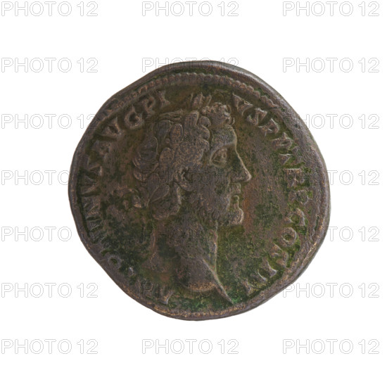 Sestertius, Antoninus Pius (86–161; Roman emperor 138–161), issuer. Obverse: head of the emperor in a laurel wreath to the right, legend ANTONINVS AVG PI-VS PP TR P COS III. Reverse: Annona (personification) stands to the right; in her lowered right hand she holds ears of corn above a modius, in her left hand a cornucopia above a ship's prow, legend ANNO-, G, in SC. Fields. Date: 140–144. Roman Empire (27 BC–476), Rome. Coin. Diameter 32.0 mm; weight 25.83 g; axis 195°. Iconography: Annona, ears of corn, modius, ships, cornucopia; personifications; head of Antoninus Pius.