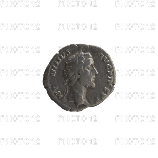 Denarius of Antoninus Pius (86–161; Roman emperor 138–161), obverse: head of the emperor with a laurel wreath facing right, inscription 'ANT · NINVS · AVG · PIVS · PP'; reverse: the emperor in a toga and veil stands left, holding a patera above a tripod with a bull lying behind it, and a scroll in his left hand, inscription 'VOTA SOL · DECENN II'; episode COS IIII, 157–159; Roman Empire (27 BC–476), Rome; coin; diameter 16.5–18.0 mm, weight 3.05 g, axis 180°.