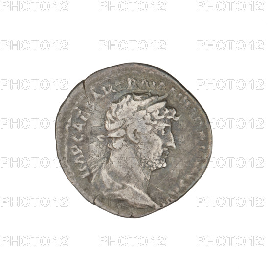 Denarius, Hadrian (76–138; Roman emperor 117–138). Obverse: Bust of Hadrian with laurel wreath facing right; rim inscription 'IMPCAESARTRAIANHADRIANVSAVG'. Reverse: Pax seated left on a chair, wearing a long dress, holding a figure of Victoria in her right outstretched hand and a branch in her left; rim inscription 'PM TR P COS III'. Date: 119–122. Rome, Roman Empire (27 BC–476). Coin; weight 2.97 g.