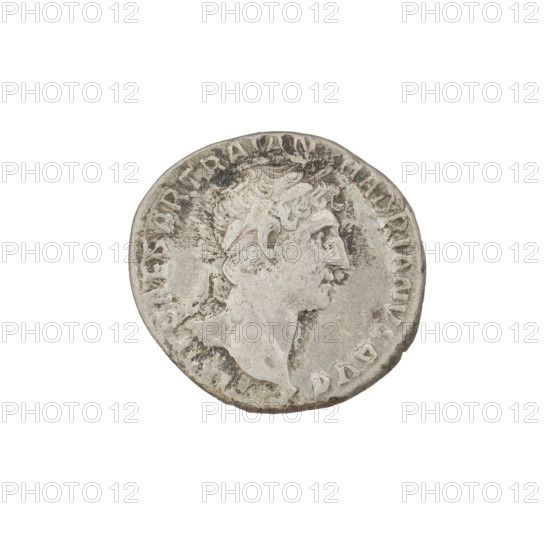 Denarius, Hadrian (76–138; Roman emperor 117–138). Obverse: Bust of Hadrian with laurel wreath facing right; rim inscription IMP CAESAR TRAIAN HADRIANVS AVG. Reverse: Roma seated left on a chair, wearing a long dress and helmet, holding a figure of Victoria in her outstretched right hand and a vertical spear in her left; rim inscription PM TR P COS III. Date: 119–122. Rome, Roman Empire (27 BC–476). Coin; weight 3.38 g.