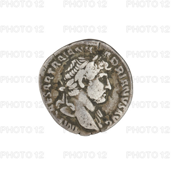 Denarius of Hadrian (117–138 CE). Obverse: Bust of Hadrian with laurel wreath facing right; rim inscription: IMPCAESARTRAIANHADRIANVSAVG. Reverse: Pax seated left on a chair, wearing a long dress, holding a figure of Victoria in her right outstretched hand and a branch in her left; rim inscription: PMTRPCOSIII. Date: 119–122 CE. Rome, Roman Empire. Coin; weight 3.15 g.