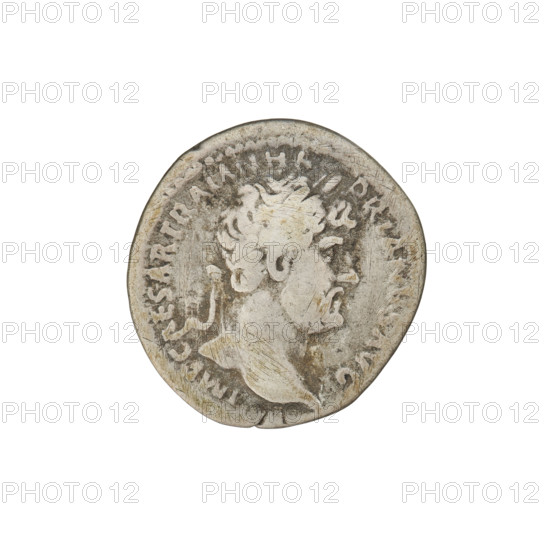 Denarius, Hadrian (76–138; Roman emperor 117–138). Obverse: Bust of Hadrian with laurel wreath facing right; rim inscription IMPCAESARTRAIANHADRIANVSAVG. Reverse: Roma seated left on a chair, wearing a long dress and helmet, holding a figure of Victoria in her outstretched right hand and a vertically placed spear in her left; rim inscription PMTRPCOSIII. Date: 119–122. Place: Rome, Roman Empire (27 BC–476). Medium: silver coin. Weight: 3.90 g.