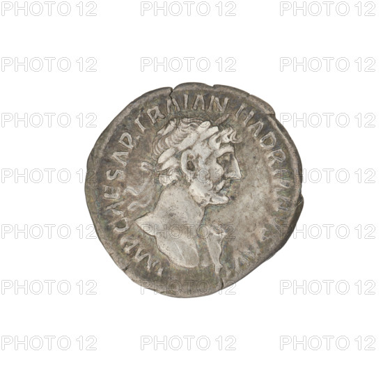 Denarius, Hadrian (76–138; Roman emperor 117–138). Obverse: Bust of Hadrian with laurel wreath facing right; rim inscription IMPCAESARTRAIANHADRIANVSAVG. Reverse: Salus (personification) seated left, wearing a long robe; in her outstretched right hand she holds a patera consecrating gifts on a lit altar in front of her, a snake entwined around the altar, her left hand rests on the back of a chair; rim inscription PM TR P COS III; field inscription SALVSAVG. Dated 119–122 CE, Rome, Roman Empire. Coin, weight 2.78 g.