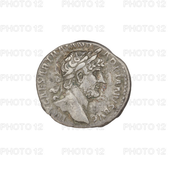Denarius of Hadrian (76–138; Roman emperor 117–138). Obverse: Bust of Hadrian with laurel wreath facing right; rim inscription IMPCAESARTRAIANHADRIANVSAVG. Reverse: Salus seated left, wearing a long robe; in her outstretched right hand she holds a patera consecrating offerings on a lit altar in front of her, a snake entwined around the altar, her left hand rests on the back of a chair; rim inscription PM TR P COS III; field inscription SALVSAVG. Date: 119–122. Rome, Roman Empire (27 BC–476). Coin; weight 3.20 g.