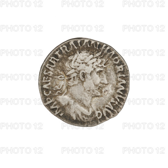 Denarius, Hadrian (76–138; Roman emperor 117–138). Obverse: Bust of Hadrian with laurel wreath facing right; rim inscription IMPCAESARTRAIANHADRIANVSAVG. Reverse: Victoria flying right, wings raised, wearing a long robe, holding a trophy with both hands; rim inscription PM TR P COS III. Date: 119–122. Place: Rome, Roman Empire (27 BC–476). Material: silver coin. Weight: 3.25 g.