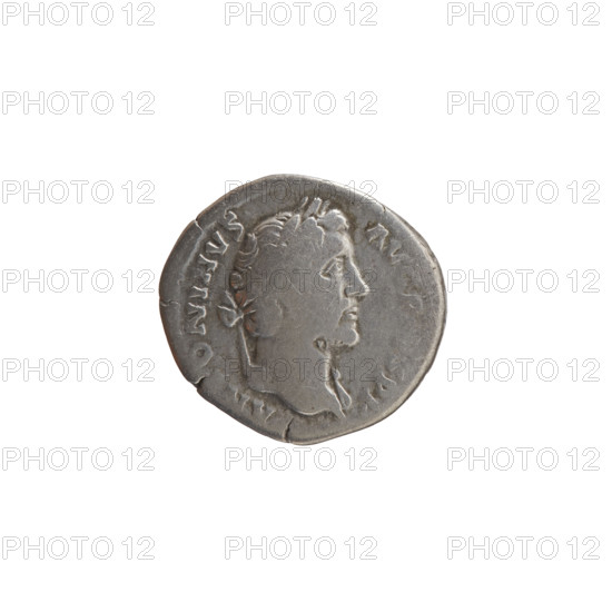 Denarius of Antoninus Pius (reigned 138–161 CE). Obverse: head of Antoninus Pius in a laurel wreath, with drapery on the left shoulder, facing right; inscription ANTONINVS AVG P P. Reverse: Virtus standing left, holding a spear with the head down in his right hand and a ceremonial dagger (parazonium) in his left; inscription TR POT COS IIII. Personification: Virtus. Attributes: spear, parazonium. Date: 145–161 CE. Culture: Roman Empire. Place: Rome. Medium: coin. Diameter: 17.5–18.5 mm. Weight: 3.05 g. Axis: 195°.