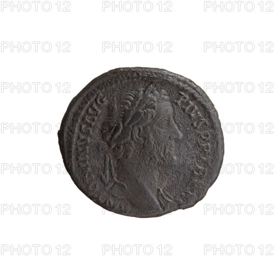 Antoninus Pius (86–161; Roman Emperor 138–161) — iconography: head of the emperor with a laurel wreath and drapery on the left shoulder; legend ANTONINVS AVG PIVS PP TR P XI all around. Reverse: emperor in toga standing left, holding a patera above a tripod in his right hand and a scroll in his left; legend C OS IIII all around, VOTA in the section, S C in the fields. Date: 147–148. Roman Empire, Rome. Coin; diameter 26.5–29.0 mm, weight 11.52 g, axis 0°.